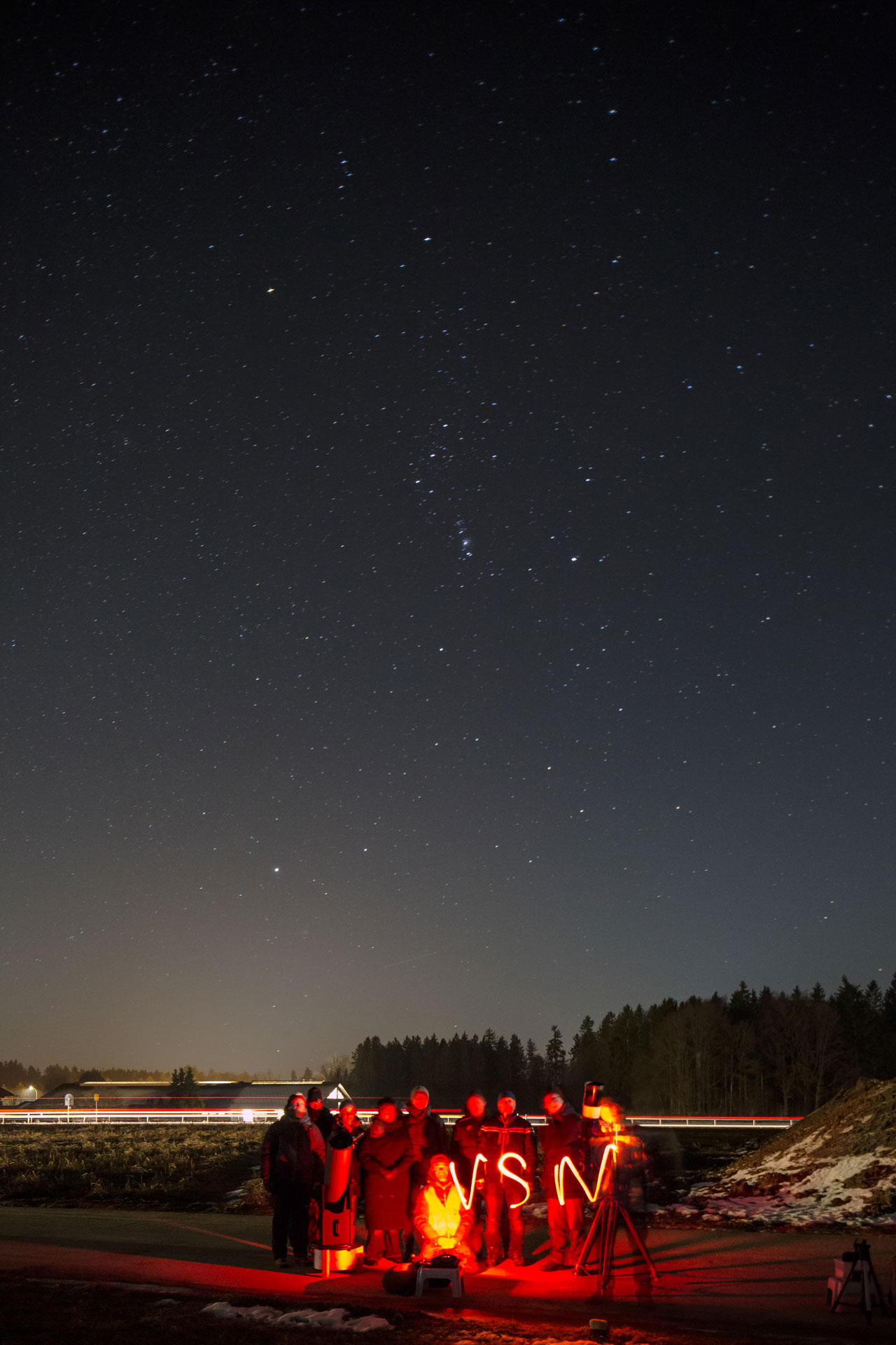 Gruppenbild mit Schriftzug und Oriob